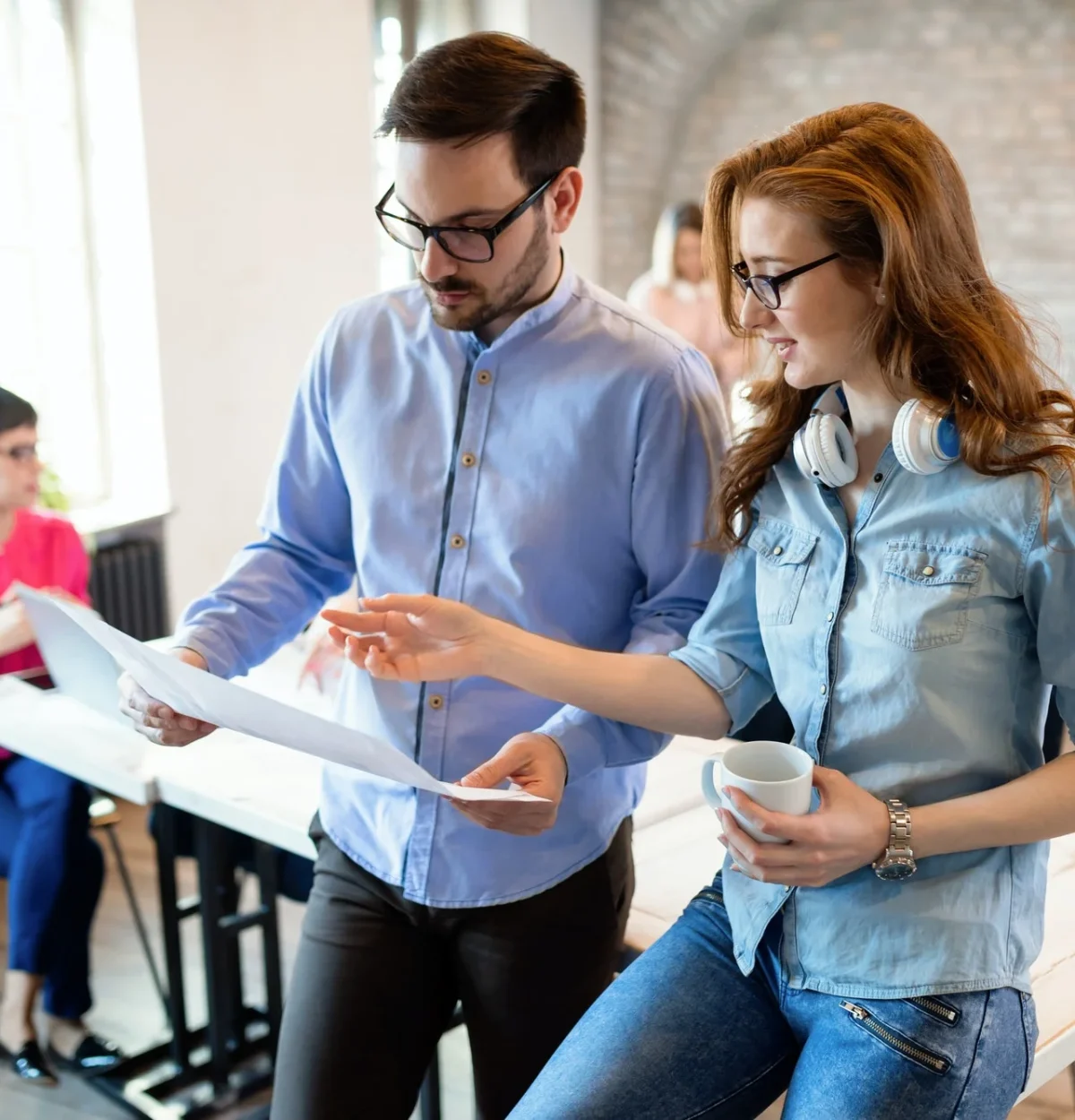 Creative coworkers working in office of digital marketing agency